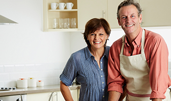 Smiling couple in a kitchen