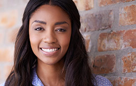 Young woman with gorgeous bright smile