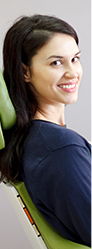 Smiling woman in dental chair